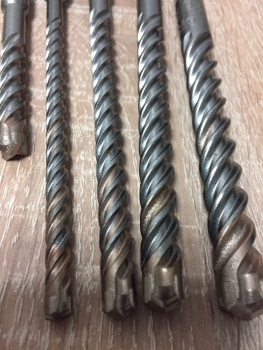 Preview: Heller SDS Plus 12mm Hammerbohrer Betonbohrer Steinbohrer Quadro - X Kreuzschneide 4Power Preview: Heller SDS Plus 12mm Hammerbohrer Betonbohrer Steinbohrer Quadro - X Kreuzschneide 4Power